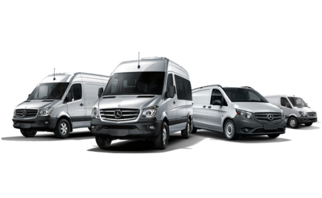 Alt text: A lineup of silver Mercedes-Benz vans, including Sprinter and Metris models, positioned at different angles against a white background.